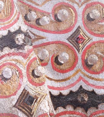 Detail of the intricate pattern of the Queens’ gown
