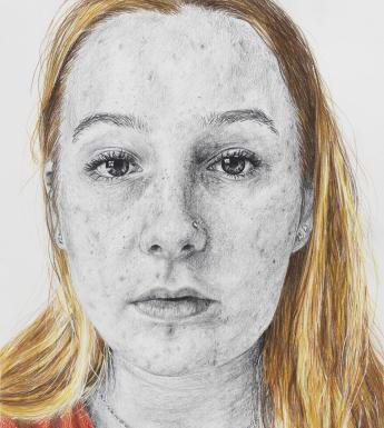 Close-up portrait of a young woman with a highly detailed face drawn in graphite, with colour used to depict her blonde hair and red top.