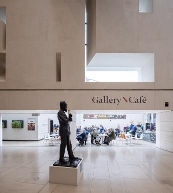 Photograph of the Gallery cafe, with a bronze statue of George Bernard Shaw in the foreground.