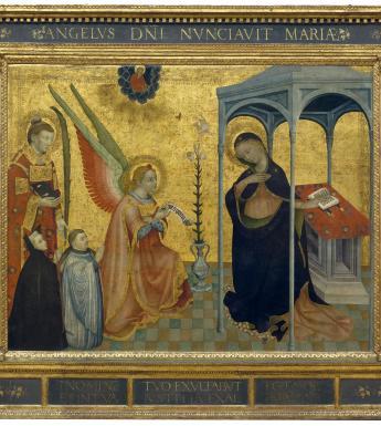 Gilded altarpiece showing Angel Gabriel telling Mary she will have a son.