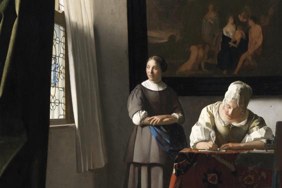 Oil painting of a woman writing a letter at a table with a maid standing beside her