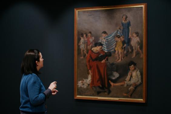 Niamh MacNally in front of a Margaret Clarke painting. © National Gallery of Ireland.