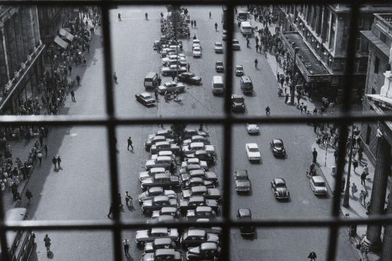Black and white photo of view of Dublin's O'Connell Street from the top of Nelson's Pillar.