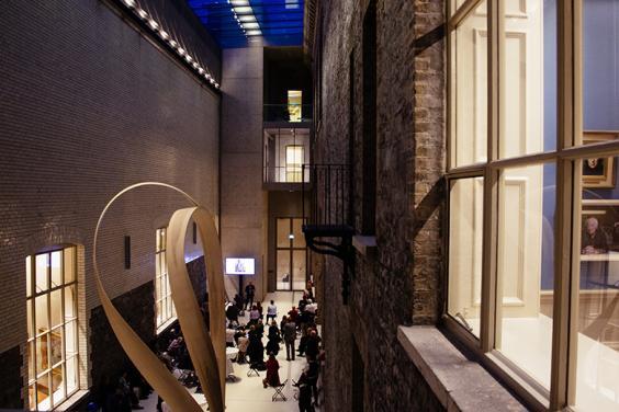 Photo of people at an evening event in the Courtyard of the National Gallery of Ireland.