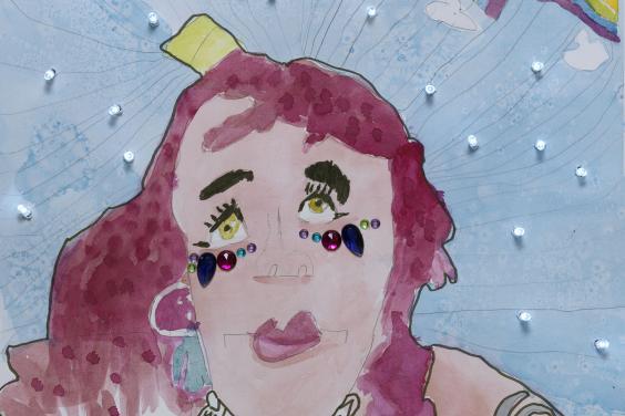 A portrait of a woman with pink hair, dressed in a green sleeveless top which shows a tattoo on her left shoulder and arm. She has jewels under her eyes, and in the blue background there is a rainbow and a constellation of small lights 