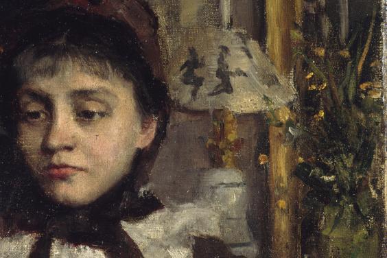 A woman's face and lamp