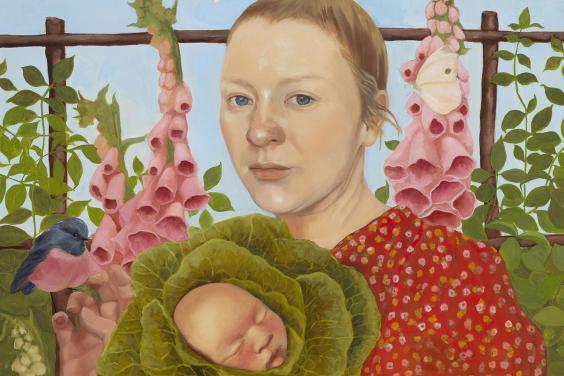 Vibrant portrait of woman standing in a garden with foxgloves while holding a cabbage which has a baby's head at the centre