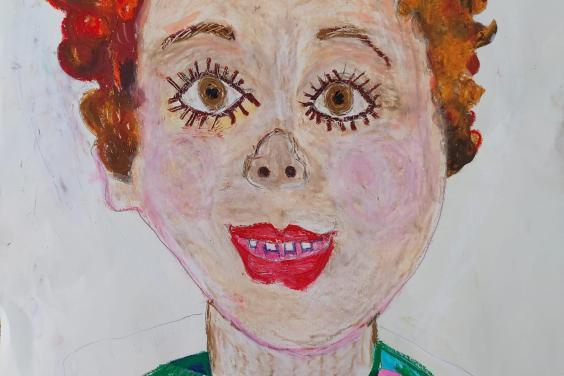 Drawing of a young boy with red curly hair and a green and pink striped top