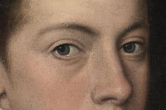 Detail of a painting showing top half of a face