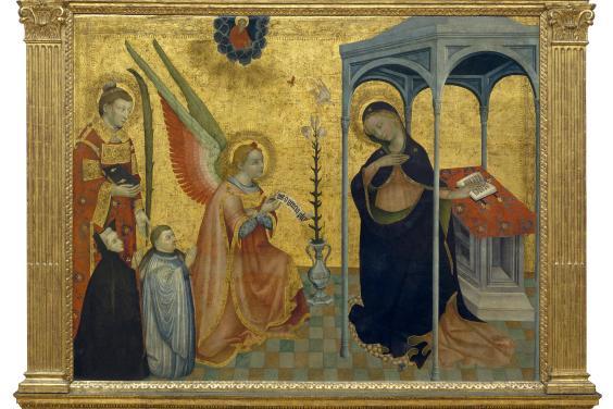 Gilded altarpiece showing Angel Gabriel telling Mary she will have a son.