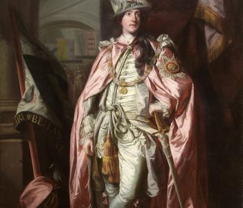 Full length portrait of man wearing a pink cape and ostrich-feather hat