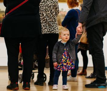 A young child on a free family friendly tour in the Millennium Wing. © National Gallery of Ireland