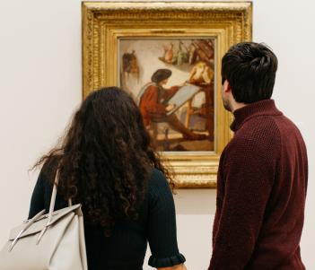 A couple in front of Thomas Couture's La Peinture Realiste. © National Gallery of Ireland.