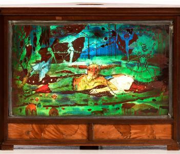 Stained glass panel of two figures reclining on green fields, surrounded by fairies.