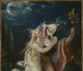 Two fairy -like creatures walk through green area at night, embracing. One wears a flower as a hat, and holds aloft a sprig of leaves. 