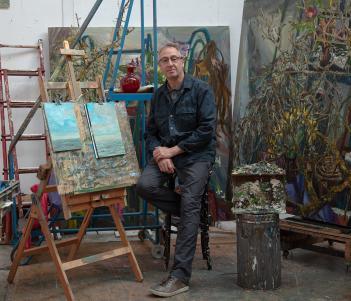 Self-portrait photo of Nick Miller in his studio