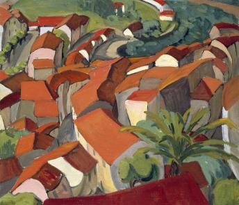 A view from above of red and orange rooftops in a green landscape