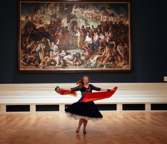 Photo of woman with rainbow flag